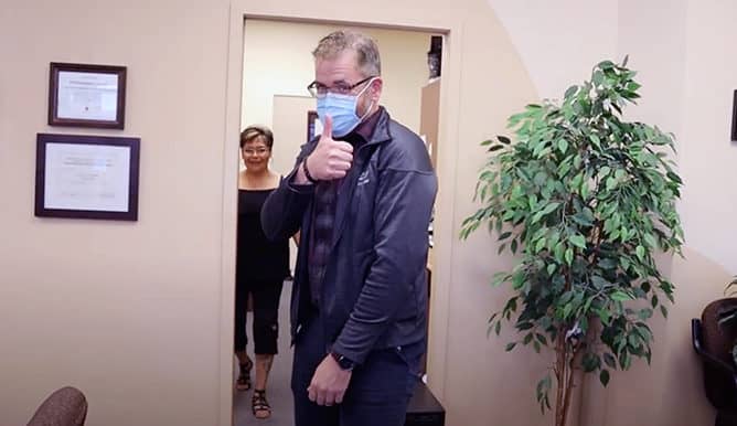 Dr. Dave giving thumbs up, while wearing his mask