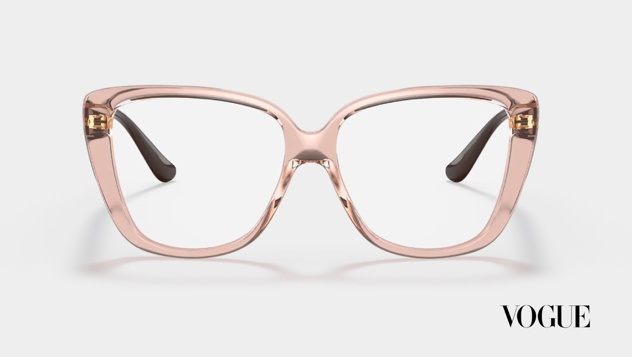 Transparent pink thick rim glasses by Vogue.